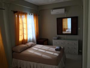Atlantic Breeze Apartments, Canouan Island客房内的一张或多张床位