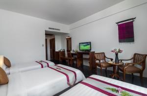 TV a/nebo společenská místnost v ubytování Kingdom Angkor Hotel