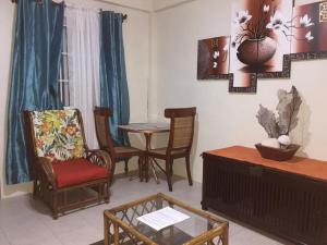 Atlantic Breeze Apartments, Canouan Island的休息区