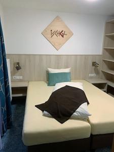 Postel nebo postele na pokoji v ubytování Lärchenheim Apartments