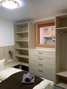 Postel nebo postele na pokoji v ubytování Lärchenheim Apartments