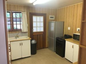 Kuchyň nebo kuchyňský kout v ubytování Dragon Peaks Mountain Resort