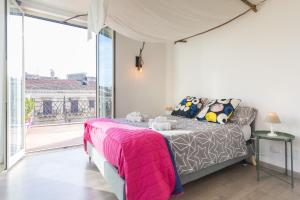 Ένα ή περισσότερα κρεβάτια σε δωμάτιο στο Terrazza Massimo