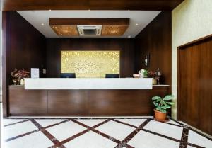The lobby or reception area at Hotel Preethi International
