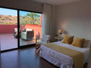 מיטה או מיטות בחדר ב-Salobre Golf Villa 3 Premium