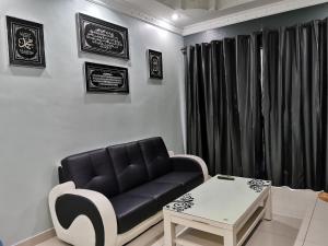 Posezení v ubytování DF ZaheenulFitri Homestay (Muslim Homestay)