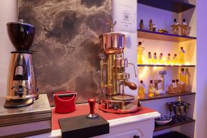 a blender sitting on top of a counter in a room at Anastasia Suites Zagreb in Zagreb