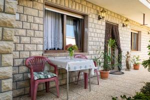 Ein Balkon oder eine Terrasse in der Unterkunft Gina