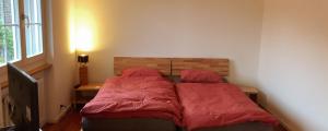 Ein Bett oder Betten in einem Zimmer der Unterkunft B&B Tomsi