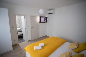 Postel nebo postele na pokoji v ubytování Villa DVORI + 37 fotografií