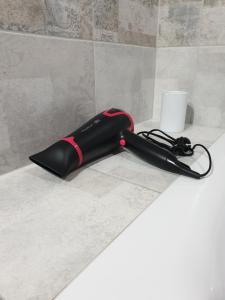 a black umbrella sitting on top of a counter at New apartment 1 in Lviv