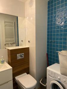Kúpeľňa v ubytovaní Apartamenty Bursztynowe w Kołobrzegu Sun&Relax