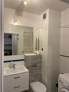 Kúpeľňa v ubytovaní Apartamenty Bursztynowe w Kołobrzegu Sun&Relax