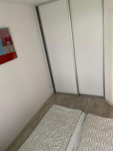 Posteľ alebo postele v izbe v ubytovaní Apartamenty Bursztynowe w Kołobrzegu Sun&Relax