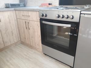 Kjøkken eller kjøkkenkrok på Haus Apartman Zaječar M&L