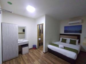 Postel nebo postele na pokoji v ubytování Yeob Bay hotel Ampang