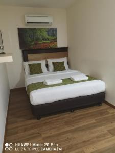 Postel nebo postele na pokoji v ubytování Yeob Bay hotel Ampang