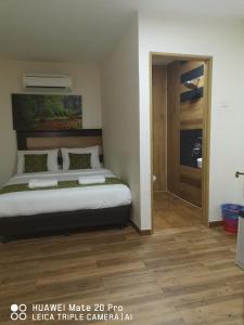 Postel nebo postele na pokoji v ubytování Yeob Bay hotel Ampang