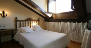 Posteľ alebo postele v izbe v ubytovaní Posada La Colodra
