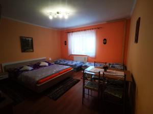 Postel nebo postele na pokoji v ubytování Apartman LALI