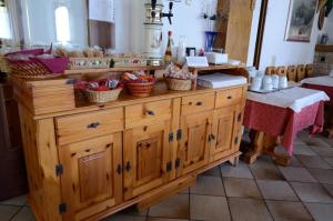 a kitchen counter filled with lots of pots and pans at Albergo Mirella in Belluno