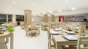 En restaurant eller et andet spisested på Ribai Hotels - Barranquilla