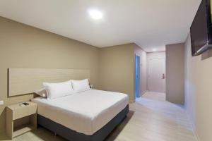 Postel nebo postele na pokoji v ubytování Ribai Hotels - Barranquilla