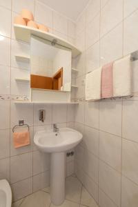Koupelna v ubytování Apartmani Biser