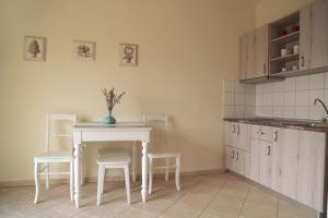 Kuchyňa alebo kuchynka v ubytovaní Triantafilia Guesthouse
