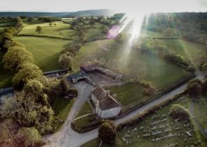 an aerial view of a house in a field at Bridge Farmhouse B&B in Hereford