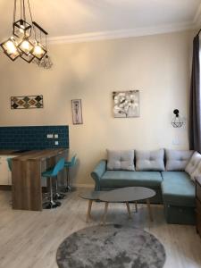 Posedenie v ubytovaní All In Apartman IV.