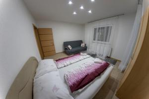 Ένα ή περισσότερα κρεβάτια σε δωμάτιο στο Apartments Aqua Resa