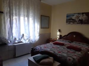 A bed or beds in a room at vacanze in sardegna