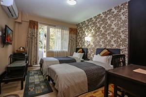 Katil atau katil-katil dalam bilik di Nirvana Home +37 gambar