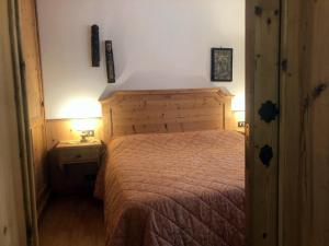 Voodi või voodid majutusasutuse Cortina Olympic Suite toas