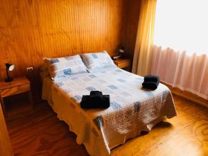 Postel nebo postele na pokoji v ubytování Rangi Moana