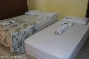 Llit o llits en una habitació de Pousada Ubajara