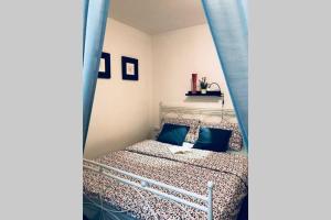 Postel nebo postele na pokoji v ubytování Apartman Volosko