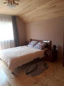 Postel nebo postele na pokoji v ubytování Садиба у Насті