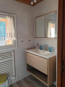 a bathroom with a sink and a mirror at Le Bivouac in Chamonix +21 photos