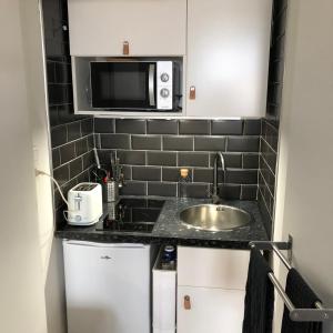 Dapur atau dapur kecil di Studio hyper centre avec Parking +2 gambar
