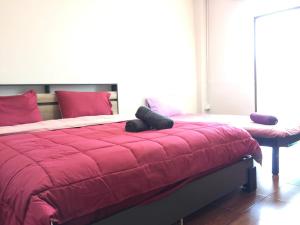 Postel nebo postele na pokoji v ubytování SMILE HOME GUESTHOUSE