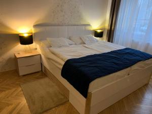 Postel nebo postele na pokoji v ubytování W19 Apartments