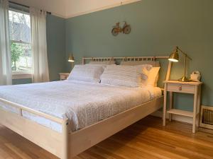 Voodi või voodid majutusasutuse Riverpath Inn toas