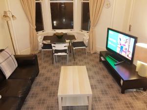 TV a/nebo společenská místnost v ubytování Glen View Apartments