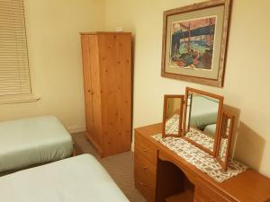 Postel nebo postele na pokoji v ubytování Glen View Apartments