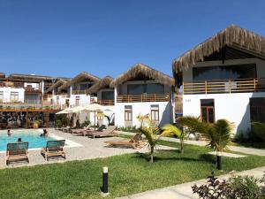 a view of a resort with a swimming pool at PARADISE EN VICHAYITO II in Vichayito