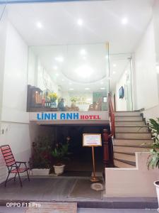a restaurant with a sign that reads inn run hotel at Linh Anh Hotel in Hanoi