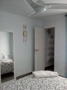 Cama o camas de una habitación en Tríplex Faro