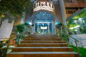 a set of stairs leading to the entrance of a building at leto city hotel in Eskisehir